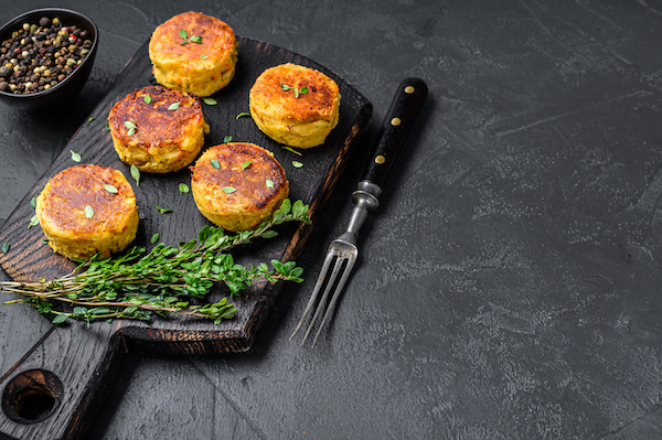 Vegetarian,Vegan,Burgers,Patty,With,Vegetables,And,Herbs.,Black,Background.