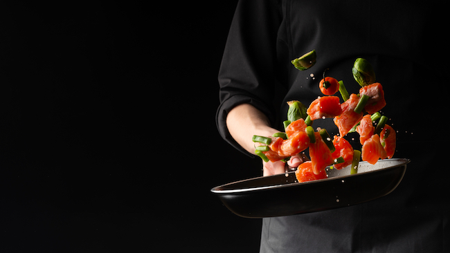 Sea,Cuisine,,Professional,Cook,Prepares,Pieces,Of,Red,Fish,,Salmon,