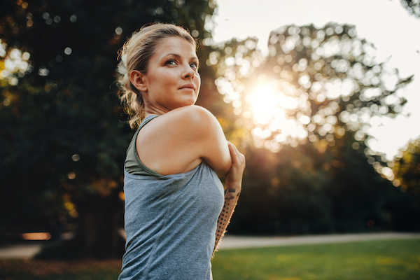 Portrait,Of,Beautiful,Young,Woman,Exercising,In,The,Park.,Caucasian