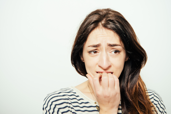 Woman,Bites,His,Nails