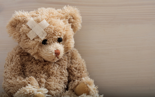 Child,Trauma,Concept.teddy,Bear,With,Bandage,On,Head,Sitting,On