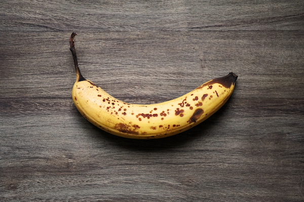 ripe banana with brown spots