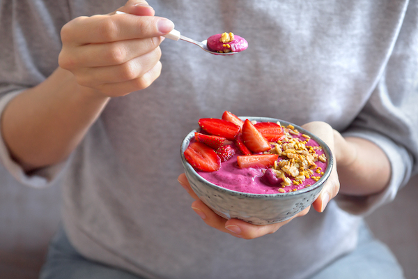 Eating,Healthy,Breakfast,Bowl.,Acai,Smoothie,,Granola,,Seeds,,Fresh,Strawberries