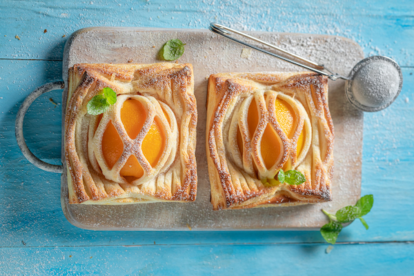 Awesome puff pastry with peaches and mint. Unique yummy cake.