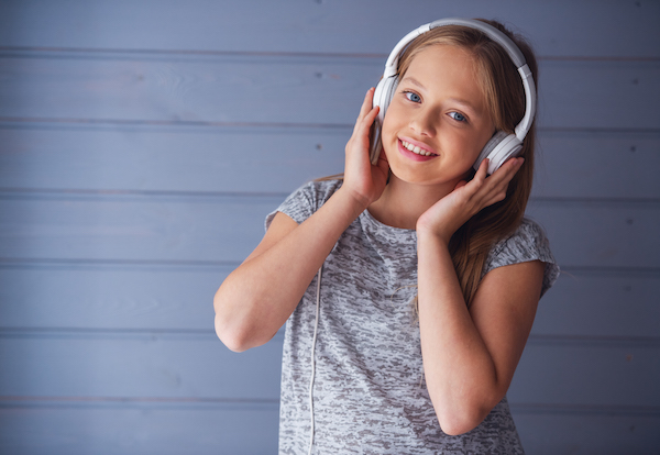 Teenage girl listening to music