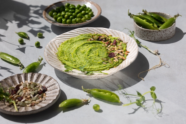 spicy-hummus-with-green-fresh-pea-shoots-healthy-2023-11-27-05-01-22-utc
