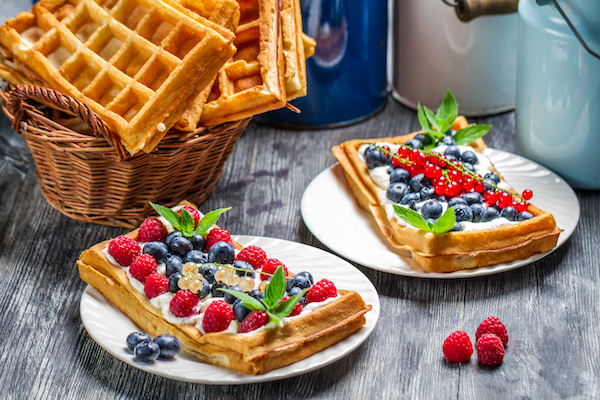 Waffles with fruit and whipped cream