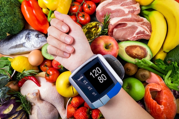 Background healthy food for controlling blood pressure. Fresh vegetables, fruits, fish, and berries. Healthy food, diet and healthy life concept. Top view