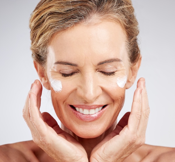 mature-woman-face-cream-and-grooming-skincare-rou-2023-11-27-05-00-56-utc