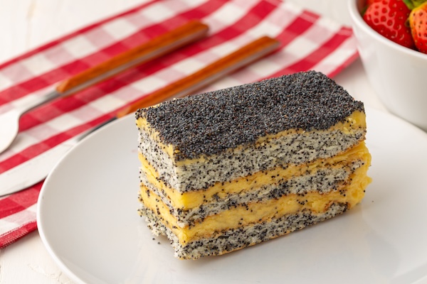 Poppy seed cake on plate close up